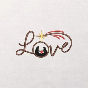 May include: Embroidered design with the word "Love" in brown script. The letter "O" in "Love" frames a silhouette of two figures and a manger. A gold star and red comet tail accent the design, ideal for Christmas.