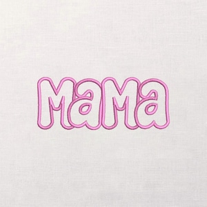 May include: Pink embroidered word "Mama" in a bubble letter style on a white fabric background. The letters are outlined in a darker pink, creating a 3D effect. The fabric has a subtle, textured appearance.