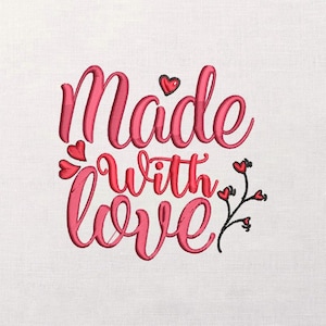 May include: Embroidered design with the words "Made with love" in a cursive font. The text is in a vibrant pink color, with small red hearts and a floral accent. The background is a plain white fabric.