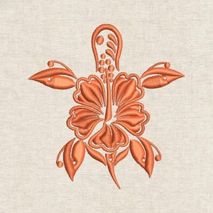 May include: An orange machine embroidery design featuring a central hibiscus flower with a prominent stamen, surrounded by stylised leaves and small circular accents, all rendered in a dense satin stitch on a light beige fabric background.