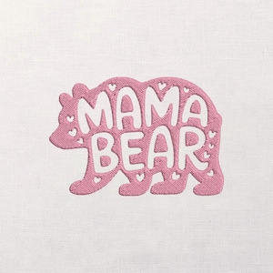 May include: Pink embroidered design of a bear with the words "MAMA BEAR" in white. The bear shape is filled with pink stitching and small white hearts. The design is on a white fabric background.