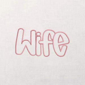 May include: A white ceramic mug with a black handle and the text "But First, Coffee" in a bold, black font. The mug is set against a blurred background, suggesting a cozy setting.