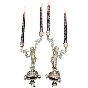 Pair of bronze candelabra decorated with Putti, 19th century / Cherubs
