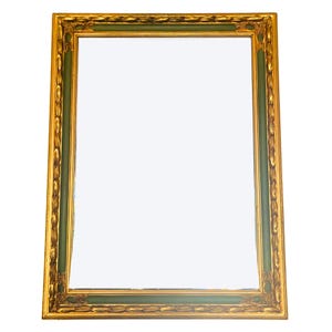 May include: Rectangular mirror with a gold-colored ornate frame and a green inner border. The frame features detailed relief patterns and a classic design, suitable for home decor.