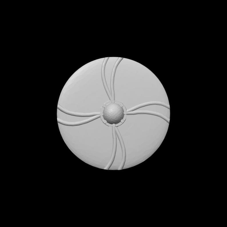 May include: A light gray, circular object with a central sphere and four curved lines radiating outwards. The object has a textured surface and is set against a black background. The design is symmetrical and appears to be a decorative element.