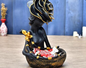 Estatua de mujer negra con cesta: elegante figura decorativa para el hogar