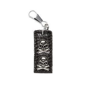May include: Black leather keychain featuring two silver skull and crossbones motifs. The keychain has a silver clasp. The skulls are detailed with a gothic design. The keychain is a rectangular shape.