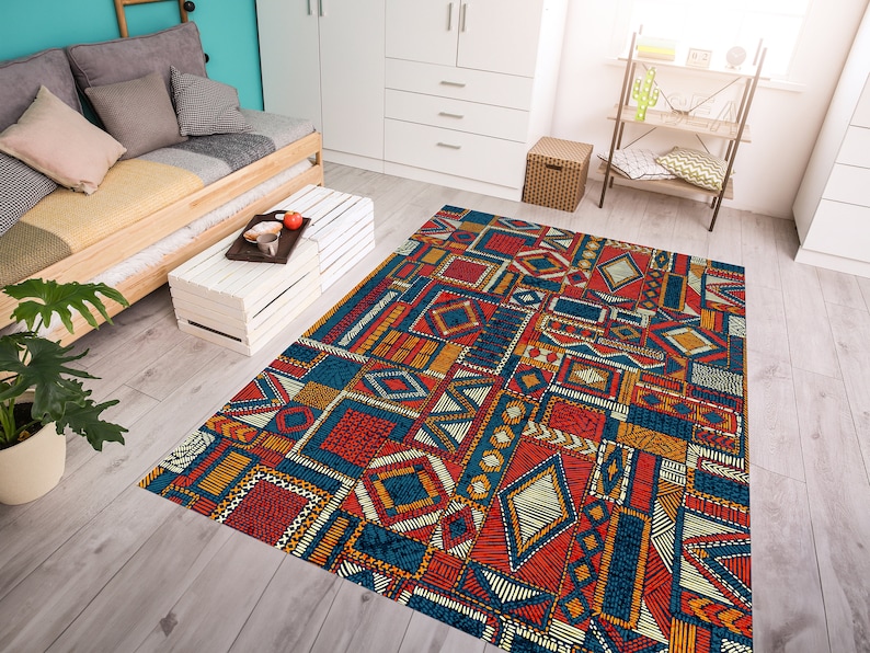 May include: A colorful area rug with a geometric pattern in shades of blue, red, yellow, and white. The rug is made of a soft, durable material and is perfect for adding a touch of style to any room.