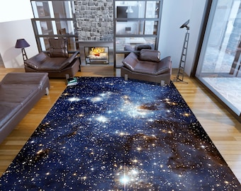 May include: A blue and white rug with a galaxy print. The rug is in a living room with a fireplace and two leather chairs.