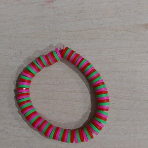 Green, pink, red sweet swirl