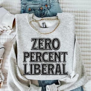 May include: A gray sweatshirt with the text "ZERO PERCENT LIBERAL" printed in black.