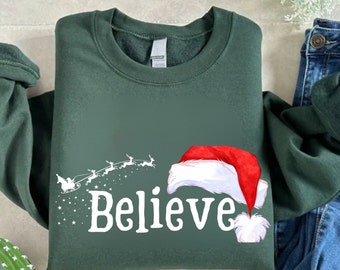 Christmas Believe Santa Clause Family Sweatshirt, Christmas Believe Shirt, Family Matching Xmas T-shirt, Merry Christmas Woman Santa Hat Tee