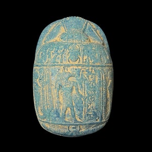 Egyptian Scarab, God Anubis and Mummified Tutankhamun with Goddess Sekhmet, Good luck scarab in Ancient Egypt.