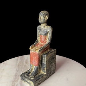 Museum Imhotep Statue - Ancient Egyptian Engineer Imhotep - the builder of Djoser&#39;s unprecedented step pyramid complex