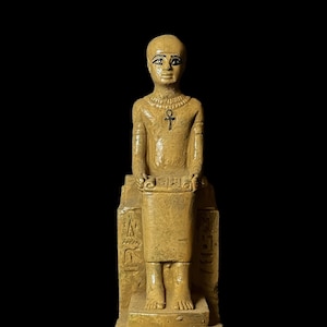 Museum Imhotep Statue - Ancient Egyptian Engineer Imhotep - the builder of Djoser&#39;s unprecedented step pyramid complex