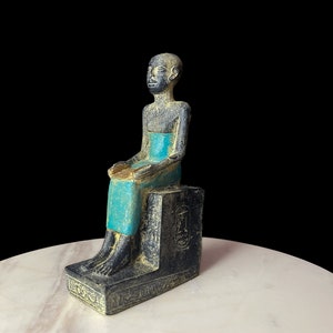 Museum Imhotep Statue - Ancient Egyptian Engineer Imhotep - the builder of Djoser&#39;s unprecedented step pyramid complex