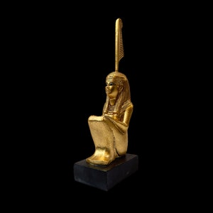 Golden leaf statue for MAAT, Goddess Ma&#39;at statue, Ma&#39;at justice statue.