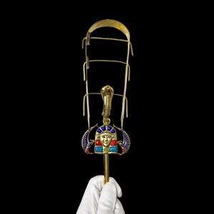 Golden Goddess Hathor Sistrum, Ancient Egyptian musical instruments, Ancient Egyptian religious artifacts, Sistrum museum collections.