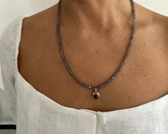 Labradorite necklace with hand knotting technique, combined with rose gold filled on sterling silver moon charm and dark blue lapis lazuli