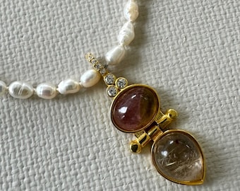 Pearl necklace made with the knotting technique, combined with a gold filled (on sterling silver) pendant with two gemstones
