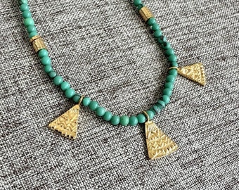 Turqouise necklace ended with 3 gold filled Egyptian symbol charms and gold filled hoops