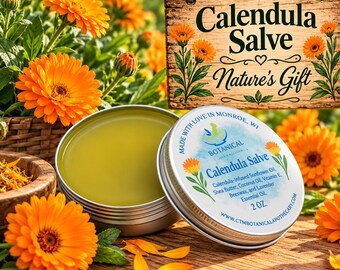 May include: A round metal tin of Calendula Salve with a light green balm inside. The lid features text including Calendula Salve, ingredients like sunflower oil, shea butter, coconut oil, vitamin E, beeswax, lavender oil, and 2 oz.