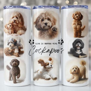 May include: White stainless steel tumbler featuring illustrations of Cockapoo dogs in various poses. The text "LIFE IS BETTER WITH Cockapoos" is written in black script. The tumbler has a blue lid.