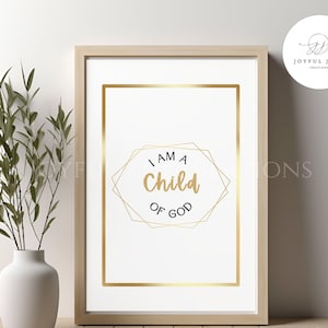May include: A printable wall art design with a gold geometric frame and the text "I am a child of God" in black text.