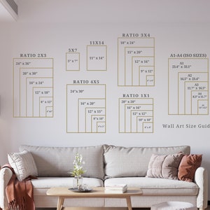 May include: A wall art size guide with different ratios and sizes for prints. The guide includes standard sizes like 5x7, 11x14, and 24x36 inches, as well as ratios like 2x3, 3x4, 4x5, and 1x1. The guide also includes standard ISO sizes like A1, A2, A3, and A4.