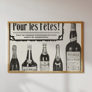 May include: A vintage advertisement for Mitchell's Finest Old Scotch Whisky. The ad features a black and white illustration of five bottles of alcohol, with the text "Pour les F&ecirc;tes!" at the top and "Voici les marques victorieuses de toute esp&egrave;ce de comp&eacute;titions." below.