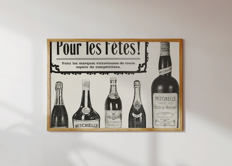 May include: A vintage advertisement for Mitchell's Finest Old Scotch Whisky. The ad features a black and white illustration of five bottles of alcohol, with the text "Pour les F&ecirc;tes!" at the top and "Voici les marques victorieuses de toute esp&egrave;ce de comp&eacute;titions." below.
