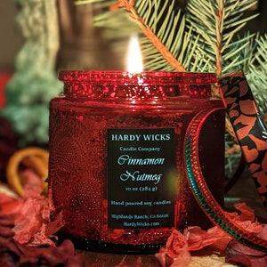 Red Embossed Glass Candle, 10oz soy wax.  The glass twinkles as candle burns.