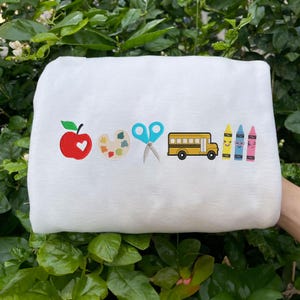 Apple Teacher Sweatshirt, Back To School Teacher Sweatshirt, Embroidered Teacher Life Crewneck Sweatshirt with Cute Teacher Icons ESE074