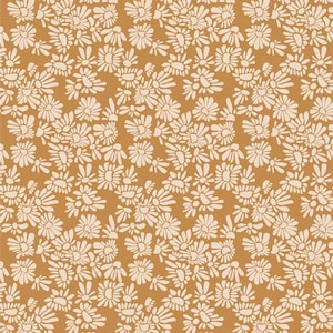 May include: A repeating pattern of off-white daisy-like flowers on a warm, golden-brown background. The flowers are densely packed, creating a textured, all-over floral design. The pattern is suitable for fabric, wallpaper, or other decorative applications.