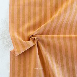 DESERT CLAY - Sun Stripes | Fableism Supply Co, cotton yarn-dyed wovens, stripe/blender, tan/peach/orange/pink/caramel fabric