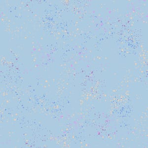 May include: A light blue background with a scattered pattern of small, light blue, pink, and beige dots.