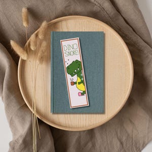 Dino-Snore Bookmark Cross Stitch Pattern | Sleepy Dinosaur in Slippers | Fun Gift for Book Lovers