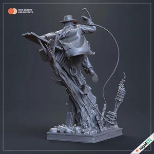 May include: A gray figurine of an adventurer in a fedora and leather jacket, mid-action with a whip. The figure is mounted on a stylized tree trunk base, with the text "HIGH-QUALITY PRE-SUPPORTS" visible. The base also has the "rapidSTL" logo.