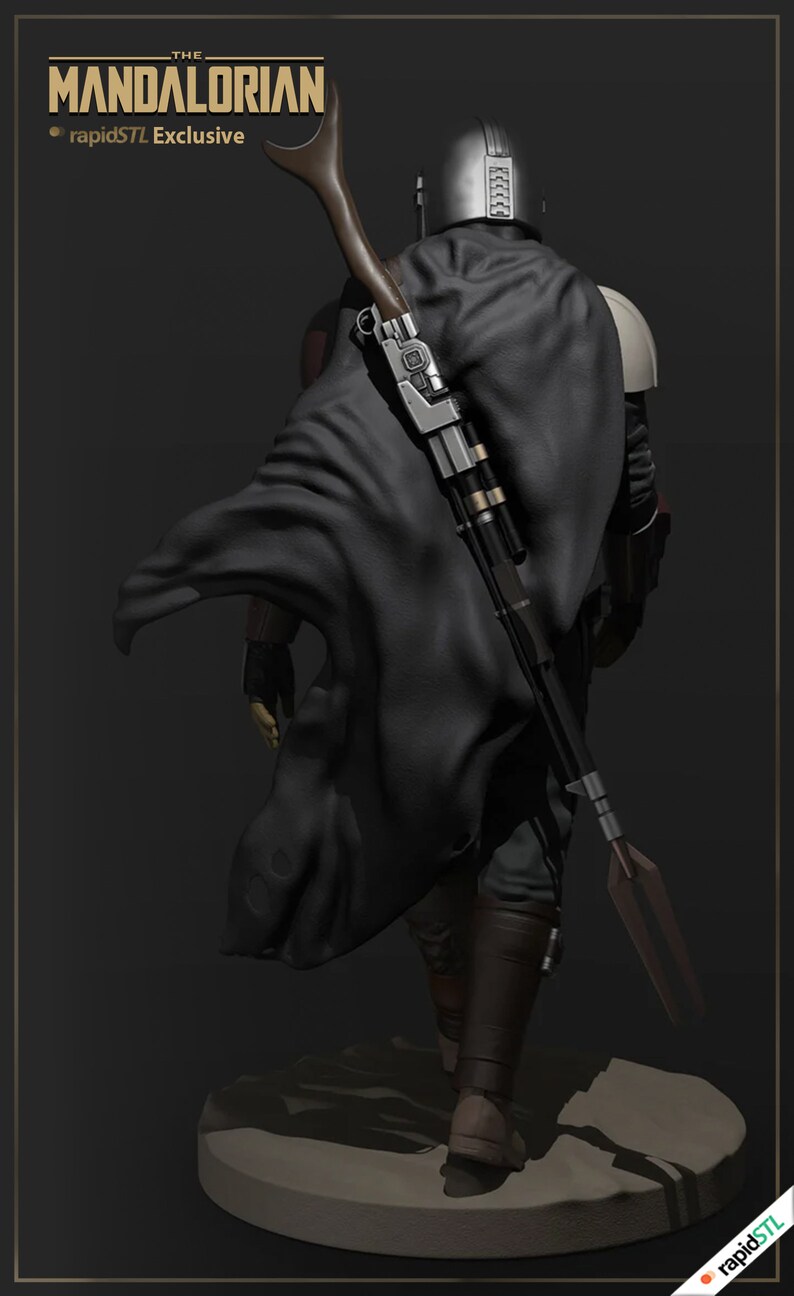 May include: A black and silver Mandalorian action figure with a cape and a weapon. The figure is standing on a brown base. The text "THE MANDALORIAN" and "rapidSTL Exclusive" is visible in the image.