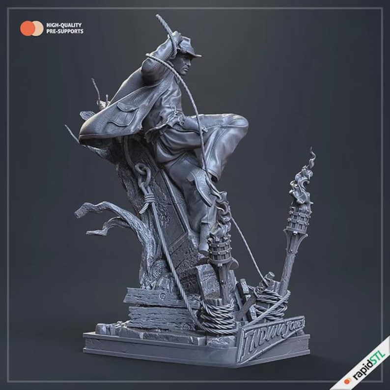 May include: A gray statue of a figure in a fedora and long coat, swinging from a rope. The statue is on a base with the words "Indiana Jones" and the rapidSTL logo. The words "HIGH-QUALITY PRE-SUPPORTS" are also visible.