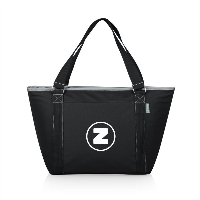 Puede incluir: Bolsa de transporte aislada negra con una cremallera blanca y un c&iacute;rculo blanco con la letra "Z" en el centro.