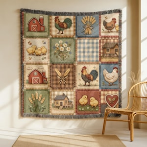 May include: A patchwork throw blanket featuring farm-themed squares. The squares depict barns, roosters, chickens, wheat, and flowers in a rustic, vintage style. The blanket has a fringed edge and is displayed on a wall.