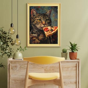Framed Wall Art of Brown Tabby Cat eating a slice of pizza