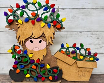 Highland Cow Christmas Wall Decor – Laser Cut Rustic Farmhouse Sign – Wooden Holiday Cow Ornament with Festive Lights