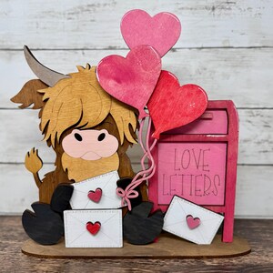 Valentine’s Day Highland Cow Wooden Decor | Love Letters & Heart Balloons | 11" x 11"