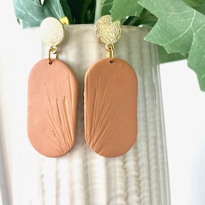 Flower imprinted earrings