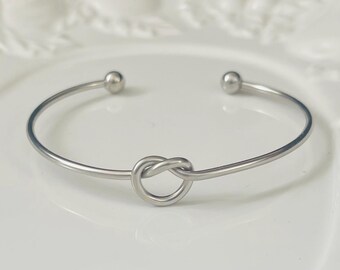 Stainless steel knot cuff measures 6” with 1” gap-2mm thick