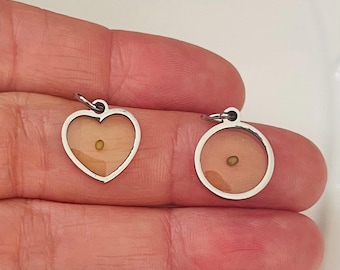 One stainless steel heart or round Mustard Seed charm-measures 14mm