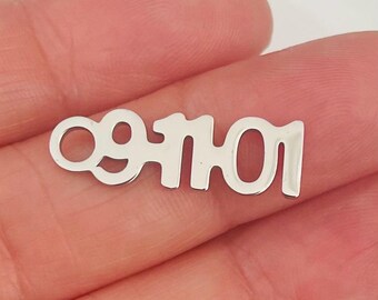 Stainless steel 9-11-01 charm-mirrored finish on both sides-Measure 25mm x 13mm-comes with jump ring