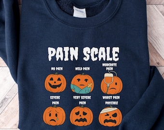 Halloween Nurse Shirt, Pain Scale Fall Pumpkin Nurse T-Shirt, RN Halloween Shirt, Pediatric Nurse Spooky Tee, Nicu Nurse Halloween Sweater